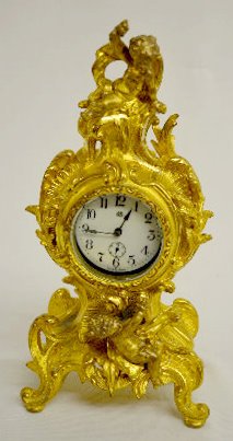 Jennings Bros. Cherub Novelty Clock — Antique Clocks Price Guide