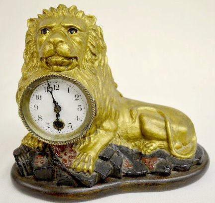 Reproduction Bradley &amp; Hubbard Animated Eye Lion Clock — Antique Clocks Price Guide