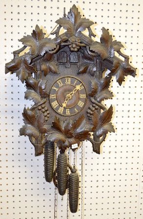 Black Forest Carved Cuckoo, — Antique Clocks Price Guide