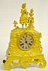 S Marti Gilt Bronze Silk String Clock, Woman