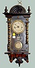 Miniature Carved RA Wall Clock