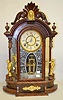 Ansonia "Triumph" Black Walnut Mirror Side Parlor Clock