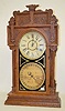 Waterbury No. 43 Double Dial Oak Calendar Clock