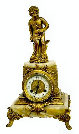 Waterbury Antique Statue Clock w/Cherub — Antique Clocks Price Guide