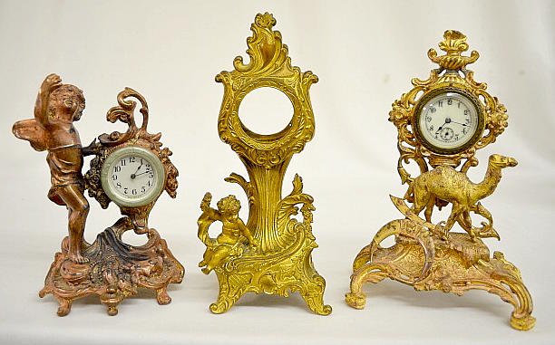 2 Novelty Clocks, Cherub, Camel &amp; 1 Cherub Case Only — Antique Clocks Price Guide