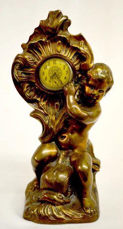 Antique Cherub &amp; Dolphin Pocket Watch Holder — Antique Clocks Price Guide