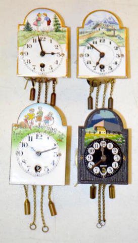 3 Enamel &amp; 1 Wood Pendulette Clocks — Antique Clocks Price Guide