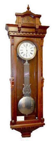 Walnut Pinwheel Jewelers Regulator — Antique Clocks Price Guide