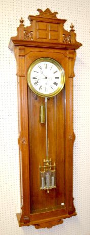 Oak Pinwheel Jewelers Regulator Clock — Antique Clocks Price Guide