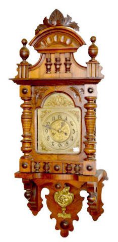 Ornate German Free Swinger Wall Clock — Antique Clocks Price Guide
